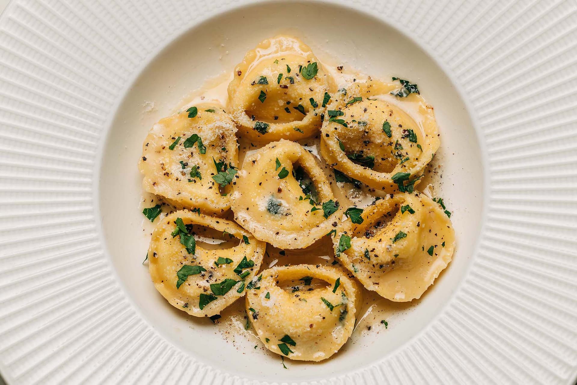 delicious pasta on an ornate plate