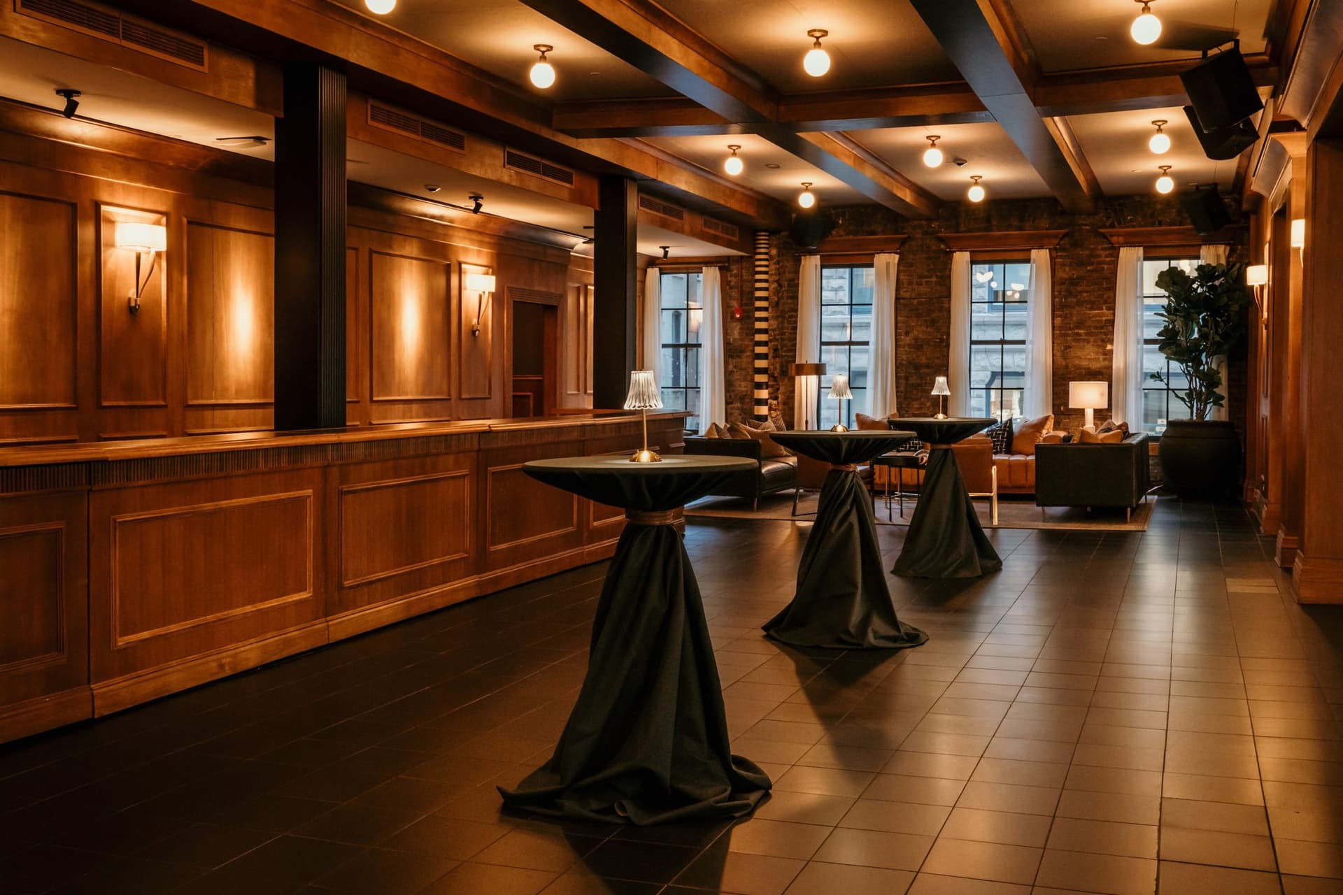 Wooden bar table with chandeliers for lighting
